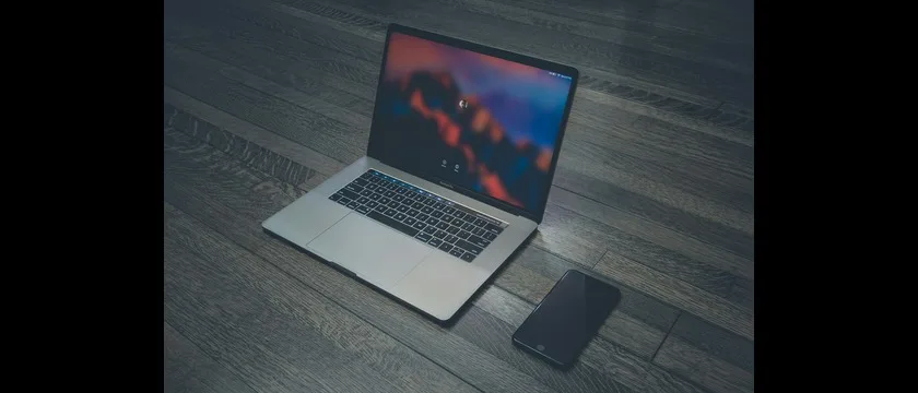 Student using a high-performance laptop for Adobe Creative Cloud, 3D modeling, and video editing projects.